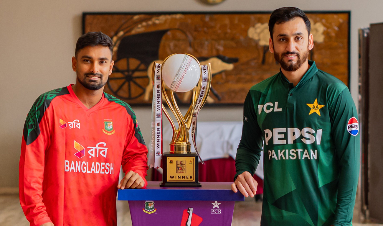 Pakistan captain Salman Agha and Bangladesh captain Litton Das (left) pose for a photo along with the trophy before the start of the match T20I series, in Dhaka on July 19, 2025. (Facebook/@PakistanCricketBoard)