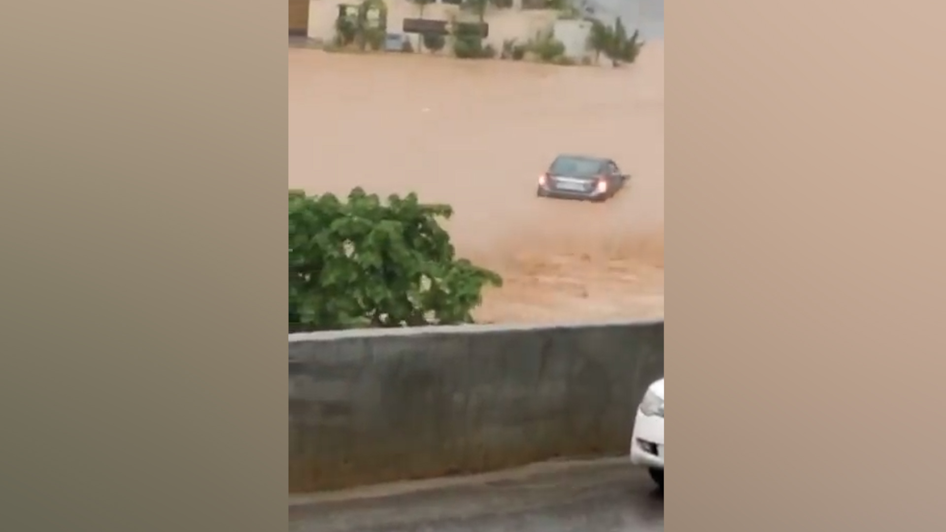 The video widely shared on social media on July 22, 2025, shows a car being swept into storm drain in Islamabad, Pakistan. (Social media)