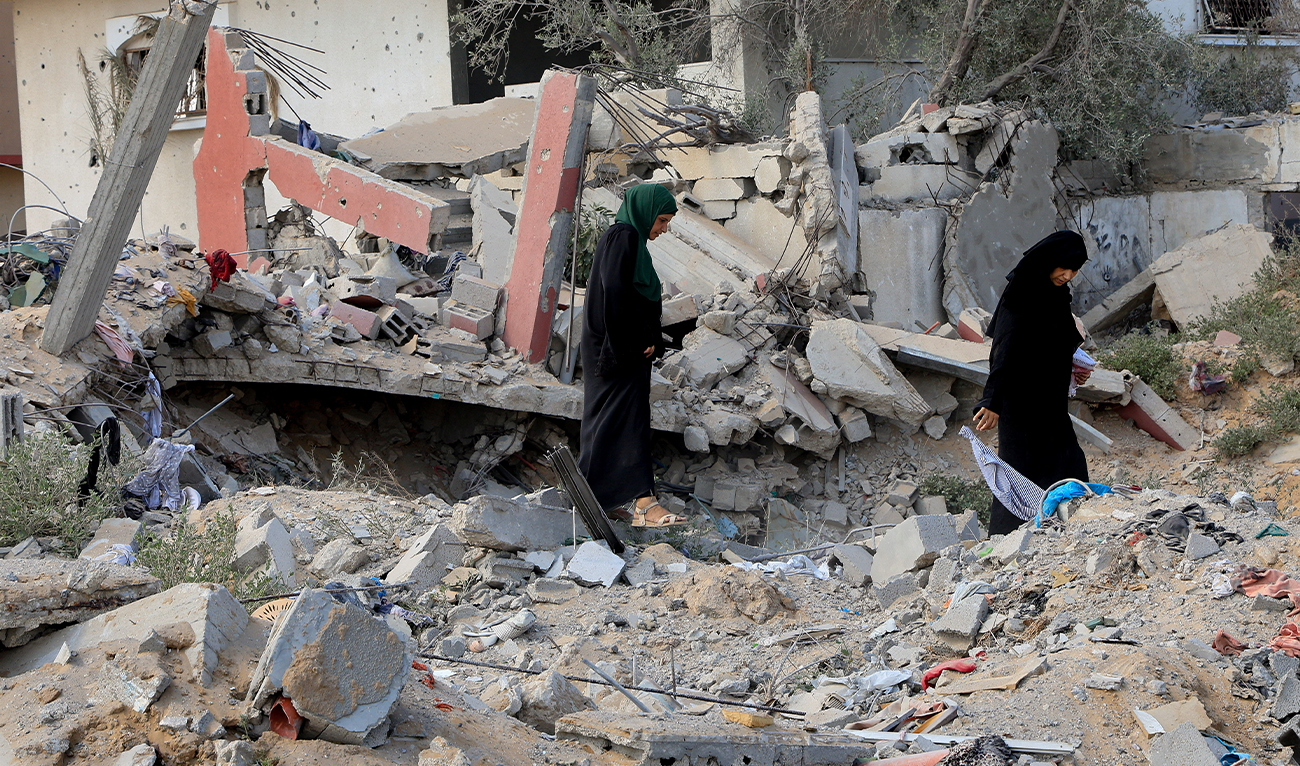 Palestinians inspect the damage to houses destroyed during an Israeli raid, in western part of Nuseirat, central Gaza Strip, on July 29, 2025 (REUTERS)
