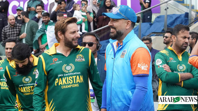 Captain of India Champions Yuvraj Singh (second right) speaks with Pakistan’s Shahid Afridi during the final match of World Championship of Legends in Birmingham, England, on July 13, 2024. (WCL/File)