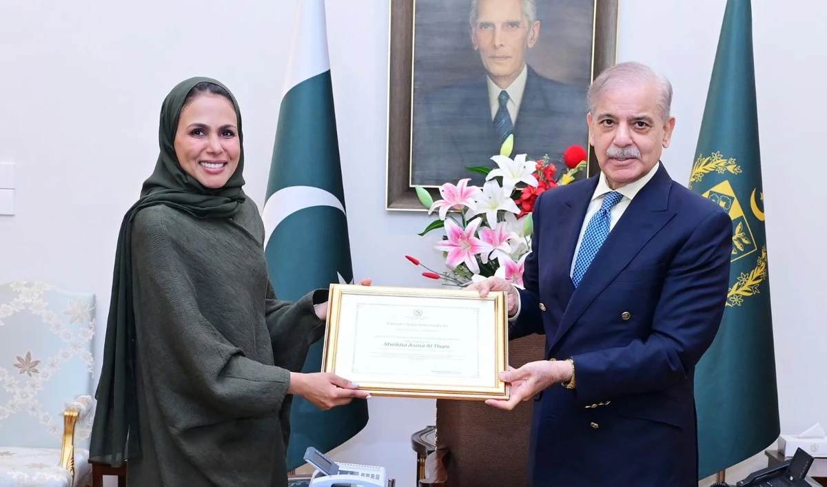 Prime Minister Shehbaz Sharif presents a certificate of nomination to Qatari mountaineer Sheikha Asma Al Thani, on July 10, 2025, in Islamabad, Pakistan. (PMO)