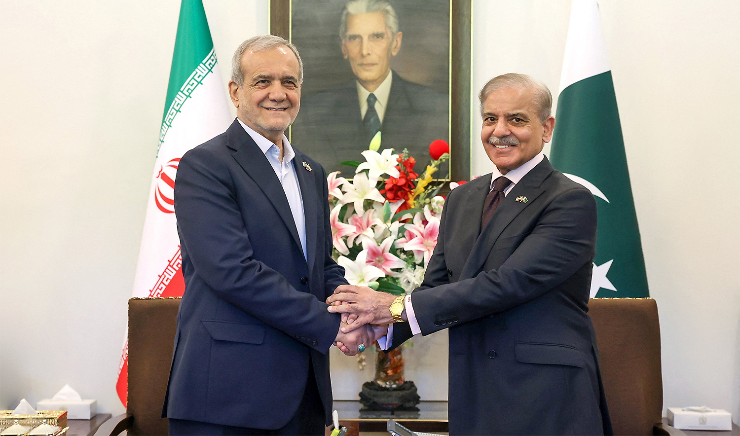 Iranian President Masoud Pezeshkian meets with Pakistani Prime Minister Shehbaz Sharif in Islamabad, Pakistan, on August 3, 2025. (Iran's Presidential website/WANA/Handout via REUTERS)