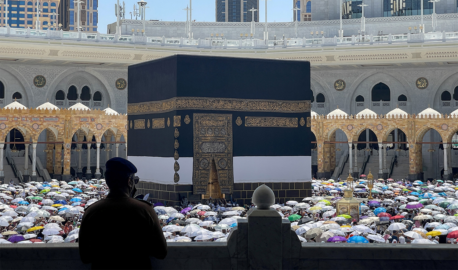 A policeman looks as Muslims perform the farewell Tawaf ritual around the Kaaba at the Grand Mosque in the holy city of Mecca, Saudi Arabia, on June 8, 2025. (REUTERS/File)