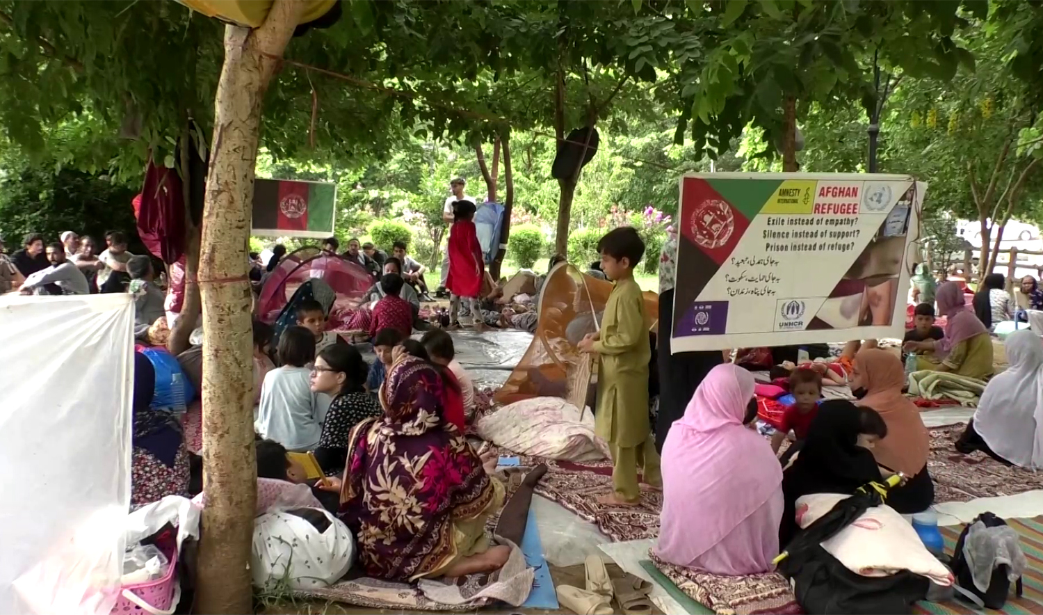 Afghan refugees take shelter at a public park in Islamabad, Pakistan, on August 9, 2025, after being evicted from their home. (REUTERS)