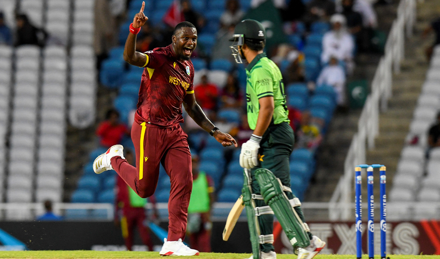 Jayden Seales (L) of West Indies celebrates the dismissal of Saim Ayub (R) of Pakistan during the 1st ODI match between West Indies and Pakistan at Brian Lara Cricket Academy in Tarouba, Trinidad and Tobago, on August 8, 2025. (AFP/File)