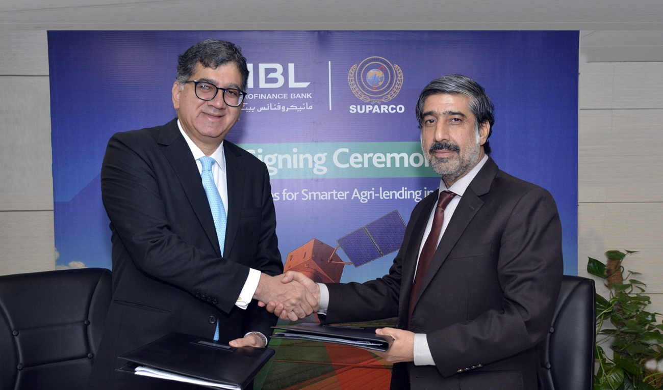 President and CEO, HBL Microfinance Bank (MfB), Amir Khan (left), shakes hands with Member (SAR), Space and Upper Atmosphere Research Commission (SUPARCO), Zafar Iqbal, after signing a memorandum of understanding (MoU) in Islamabad, Pakistan, on August 10, 2025. (HBL MfB)
