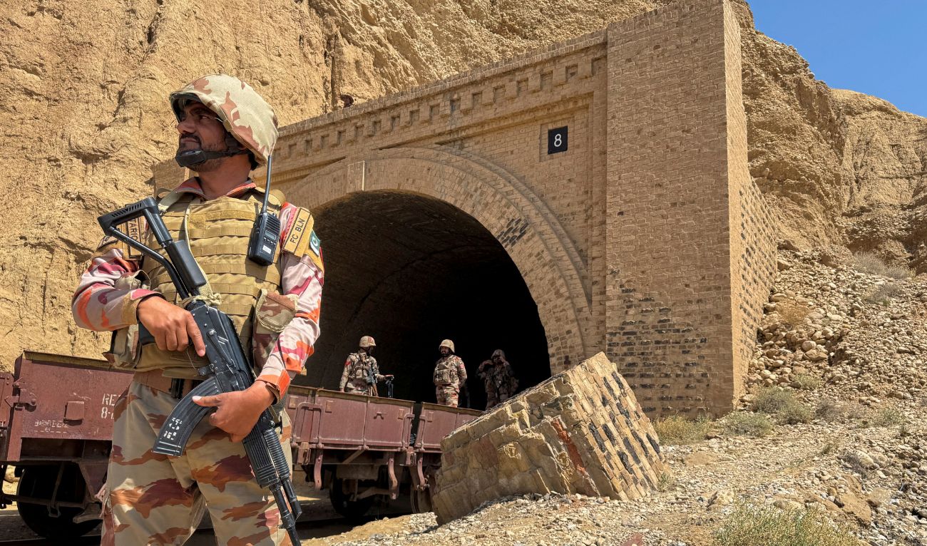 Pakistan army soldiers stand at a tunnel where the Jaffar Express train was attacked by separatist militants, in Bolan, Balochistan, Pakistan, March 15, 2025. (REUTERS)