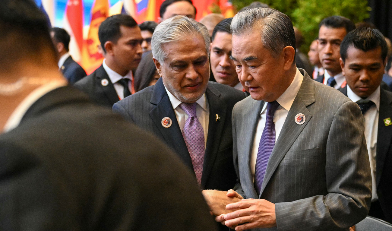 Pakistan's Deputy Prime Minister, Ishaq Dar (left) talking with China's Foreign Minister, Wang Xi at the 58th ASEAN Foreign Ministers' meeting in Kuala Lumpur, Malaysia, on July 11, 2025. (AFP/File)