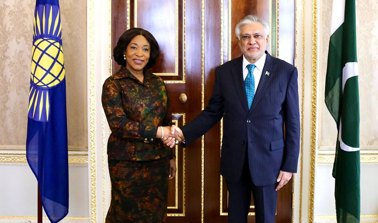 Pakistan Deputy Prime Minister Ishaq Dar shakes hands with Commonwealth Secretary General Shirley Ayorkor Botchwey during a meeting in London on August 19, 2025. (Handout/MoFA)
