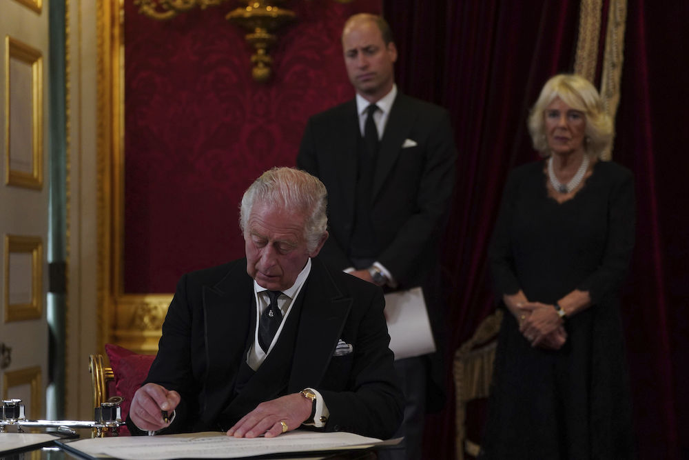 King Charles III signs an oath to uphold the security of the Church in Scotland during the Accession Council at St James's Palace in London on Sept. 10, 2022. (AP/File)