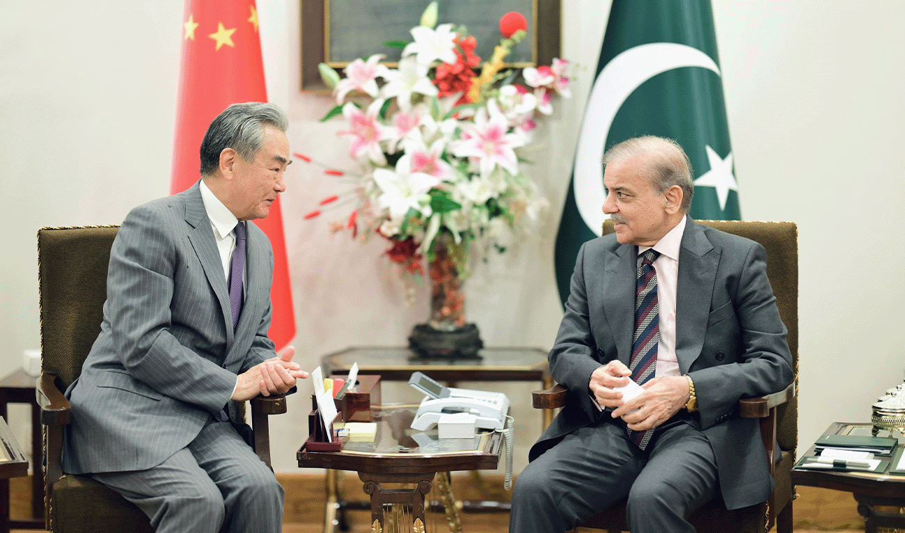 Chinese Foreign Minister, Wang Yi (left), in conversation with Pakistan's Prime Minister, Shehbaz Sharif, at Prime Minister's office in Islamabad, Pakistan, on August 21, 2025. (Government of Pakistan)