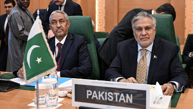 Pakistani Deputy Prime Minister Ishaq Dar (right) attends the Organization of Islamic Cooperation (OIC) meeting in Jeddah, Saudi Arabia, on August 7, 2024. (AFP/File)