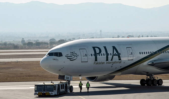 Pakistan International Airline (PIA) aircraft taxis ahead of its takeoff for Paris at the Islamabad International Airport on January 10, 2025. (AFP/File)