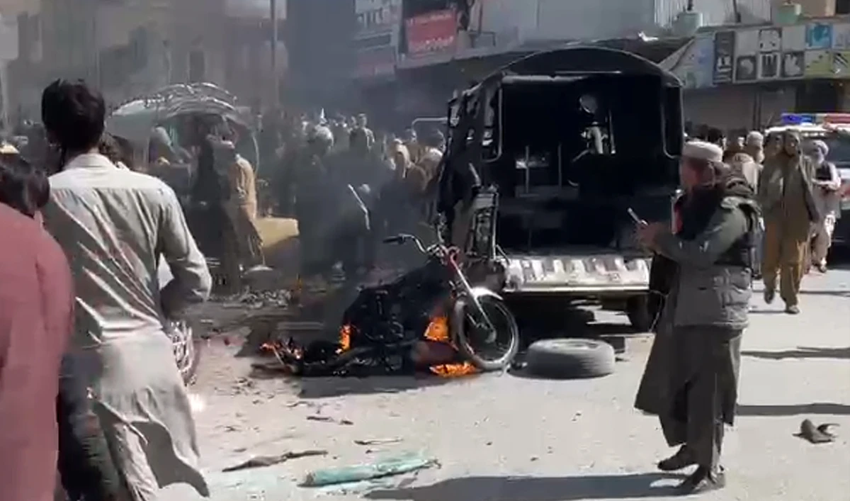 People gather near a police van targeted in a militant attack in Quetta, Balochistan on March 27, 2025. (AN photo/File)