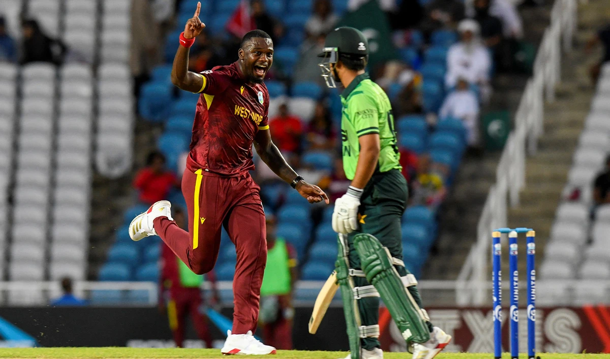Jayden Seales (L) of West Indies celebrates the dismissal of Saim Ayub (R) of Pakistan during the 1st ODI match between West Indies and Pakistan at Brian Lara Cricket Academy in Tarouba, Trinidad and Tobago, on August 8, 2025. (AFP/File)