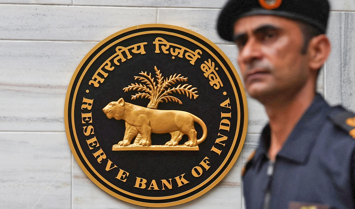 A man walks past the Reserve Bank of India (RBI) logo outside its headquarters in Mumbai, India, on June 6, 2025. (REUTERS/File)