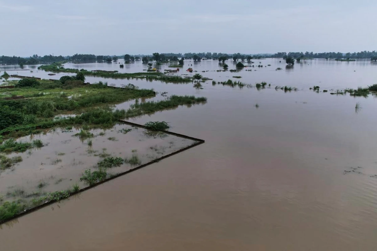 An area surrounded by floodwater is seen after torrential rains on the outskirts of Narowal, Pakistan, on August 27, 2025. (AP)