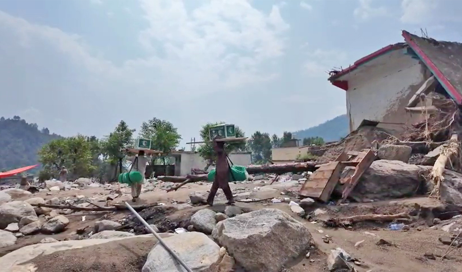 The video shared by KSrelief on Septmeber 3, 2025, shows flood-affected families carrying relief kits in Pakistan's northwestern Khyber Pakhtunkhwa (KP) province. (KSrelief)