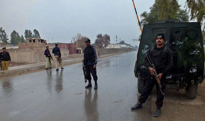 Pakistani policemen cordon the area near the military checkpost following an attack by militants in the Sari Norang area of Lakki Marwat district, around 240 kilometers (149 miles) south of Peshawar on February 2, 2013. (AFP/FILE)
