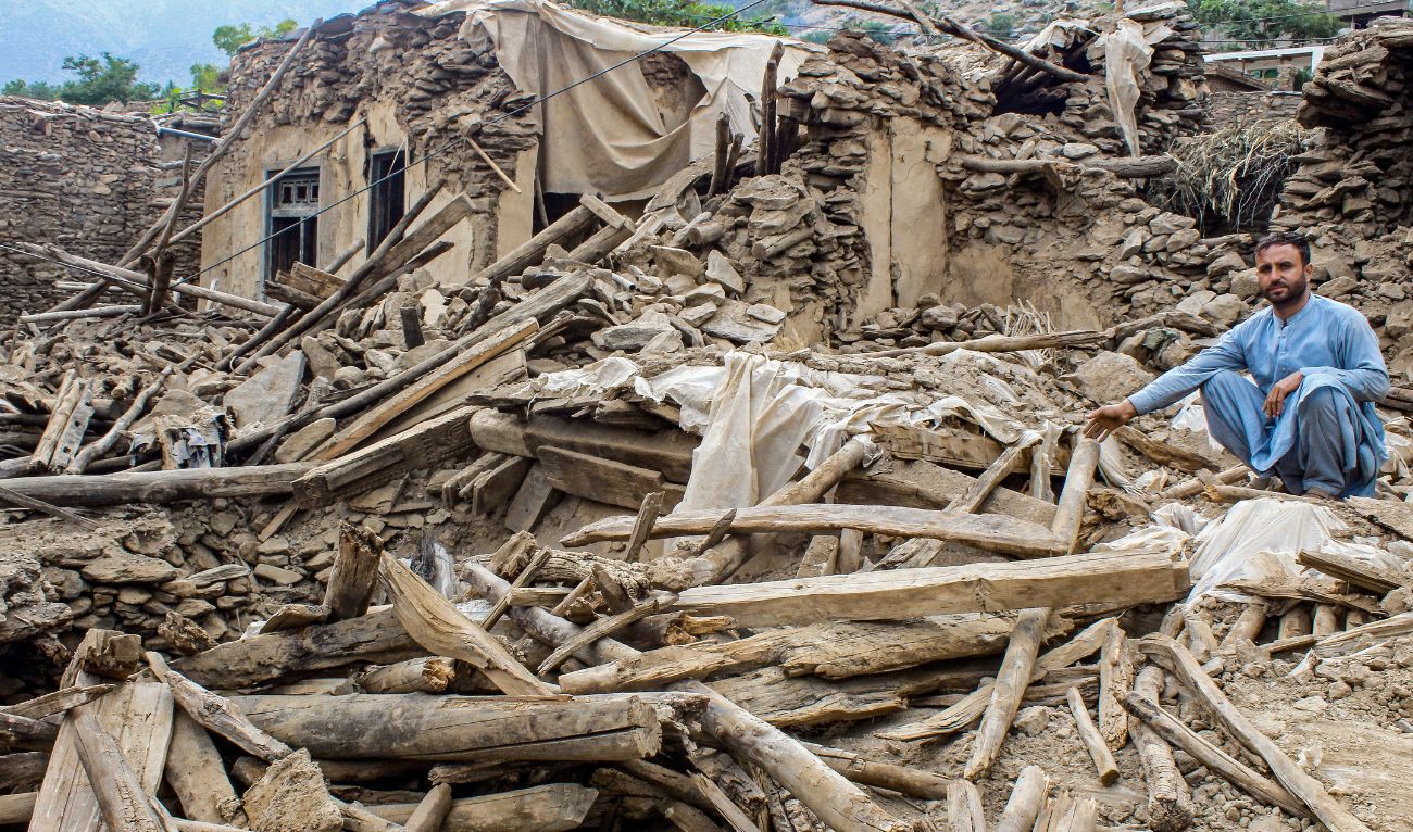 An Afghan man sits amid the remains of a damaged house, in the aftermath of an earthquake at the Dara-i-Nur district of Nangarhar province on September 3, 2025. (AFP)