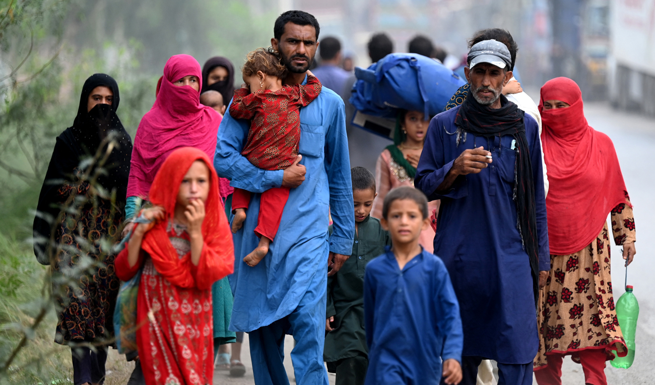 Afghan refugees arrive at the UNHCR repatriation center in Azakhel, Khyber Pakhtunkhwa province on August 23, 2025. (AFP/File)