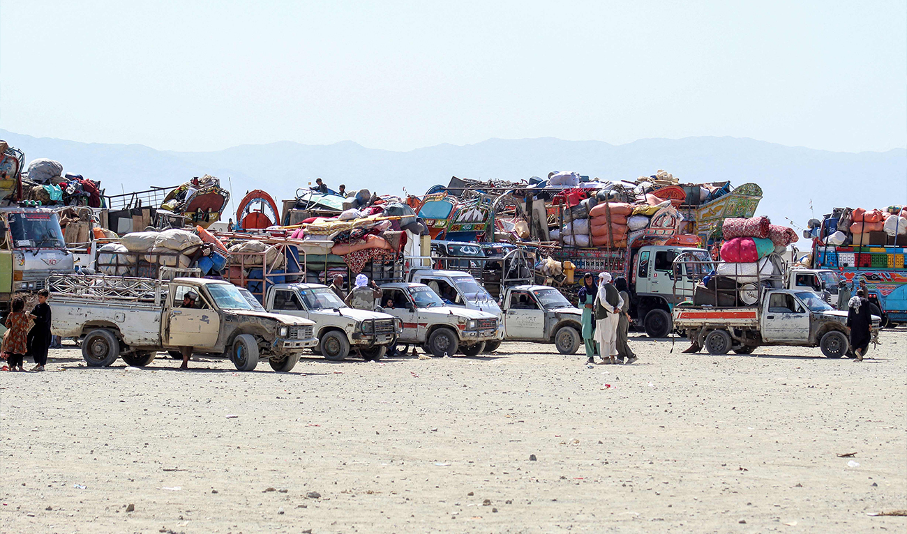 Afghan refugees along with their belongings await deportation to Afghanistan at a holding center near the Pakistan-Afghanistan border in Chaman, Pakistan, on September 4, 2025. (AFP)