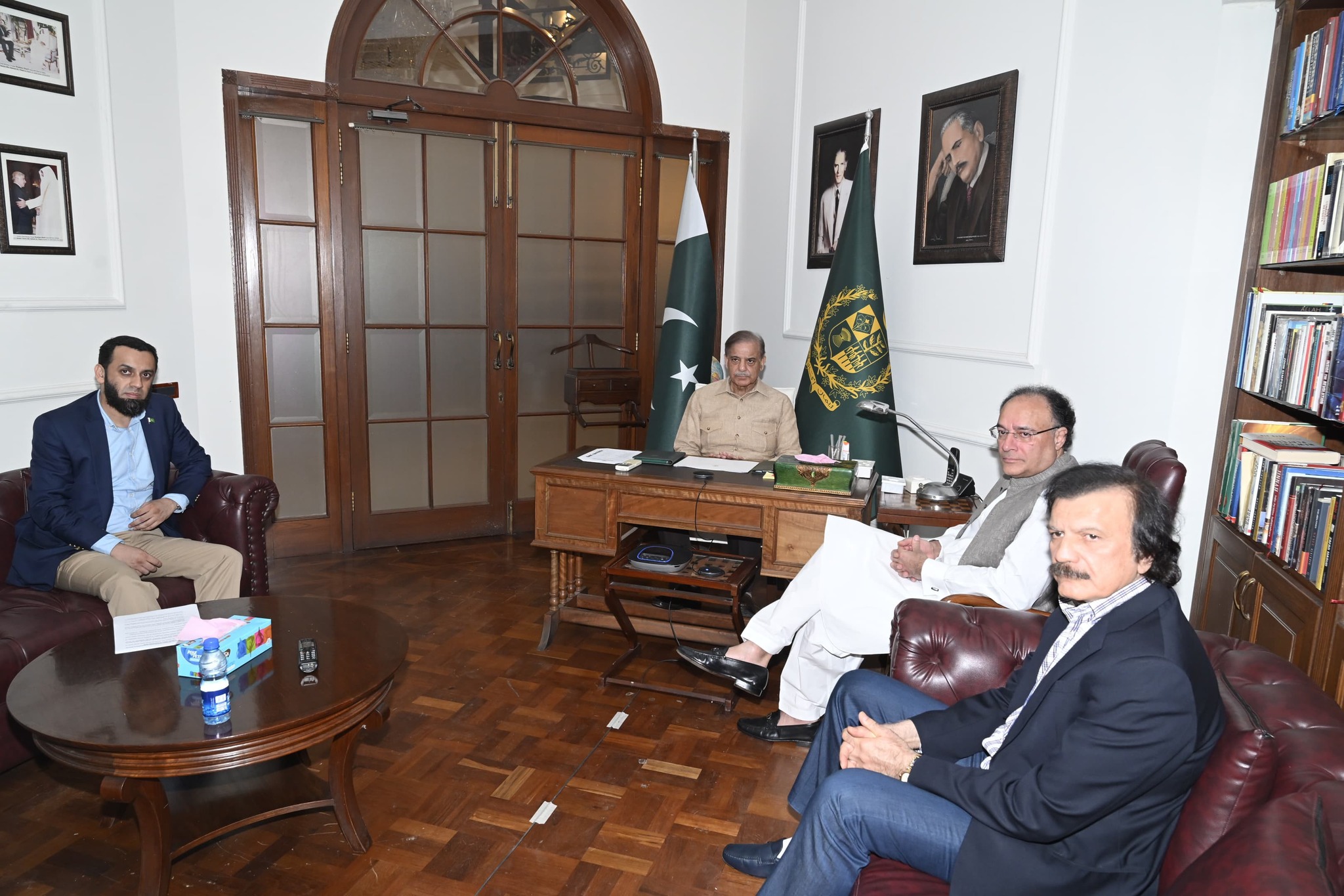 Pakistan Prime Minister Shehbaz Sharif chairs a meeting regarding electricity bills in flood hit areas, in Lahore on September 13, 2025. (Handout/PMO)