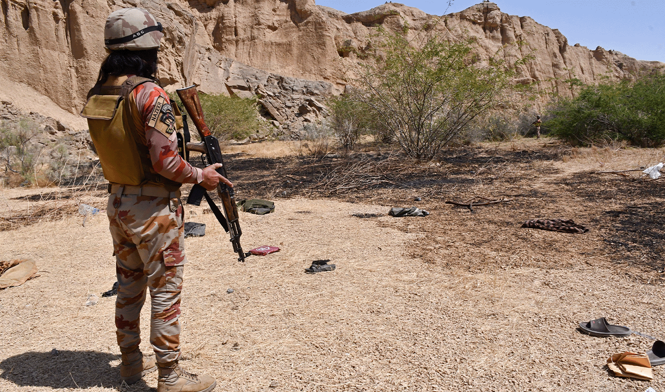 Pakistan's Frontier Corps stands guard at the siege site after armed militants ambushed a train in the remote mountainous area, at Pehro Kunri in Balochistan province on March 15, 2025. (AFP/File)
