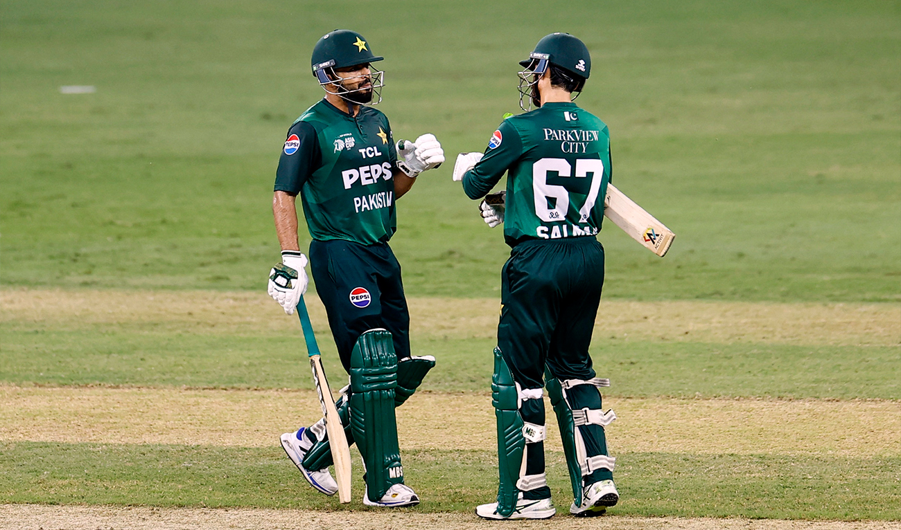 Pakistan’s Mohammad Nawaz speaks to Salman Ali Agha (right) during the Asia Cup cricket match between India and Pakistan at Dubai International Cricket Stadium, United Arab Emirates, on September 21, 2025. (AP/File)