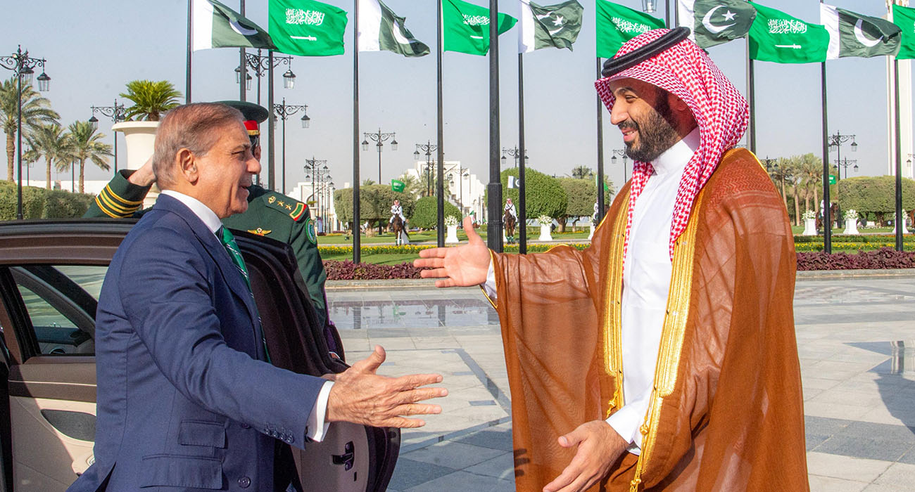 A handout picture provided by the Saudi Press Agency (SPA) on September 17, 2025, shows Saudi Arabia's Crown Prince Mohammed bin Salman (R) welcoming Pakistan's Prime Minister Shehbaz Sharif ahead of their meeting in Riyadh. (AFP)