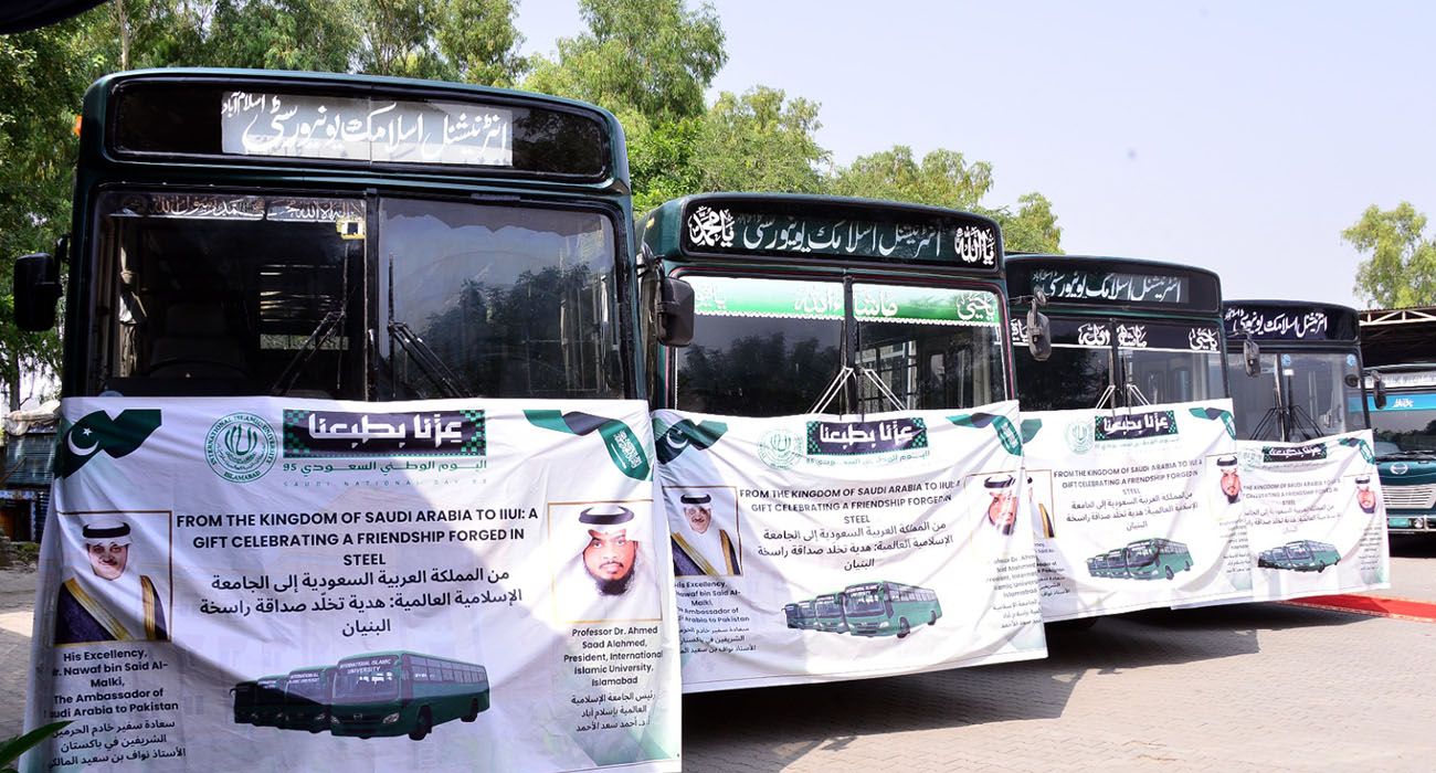 The photo taken on September 23, 2025, shows a fleet of busses presented to Pakistan's International Islamic University Islamabad (IIUI) by Saudi Arabia. (Saudi Embassy in Islamabad)