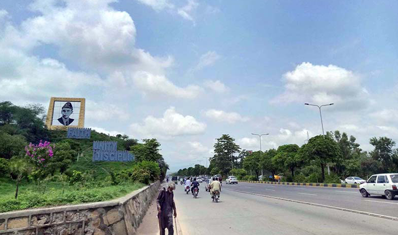 Commuters drive past a popular landscape in Islamabad on July 10, 2025. (APP/File)