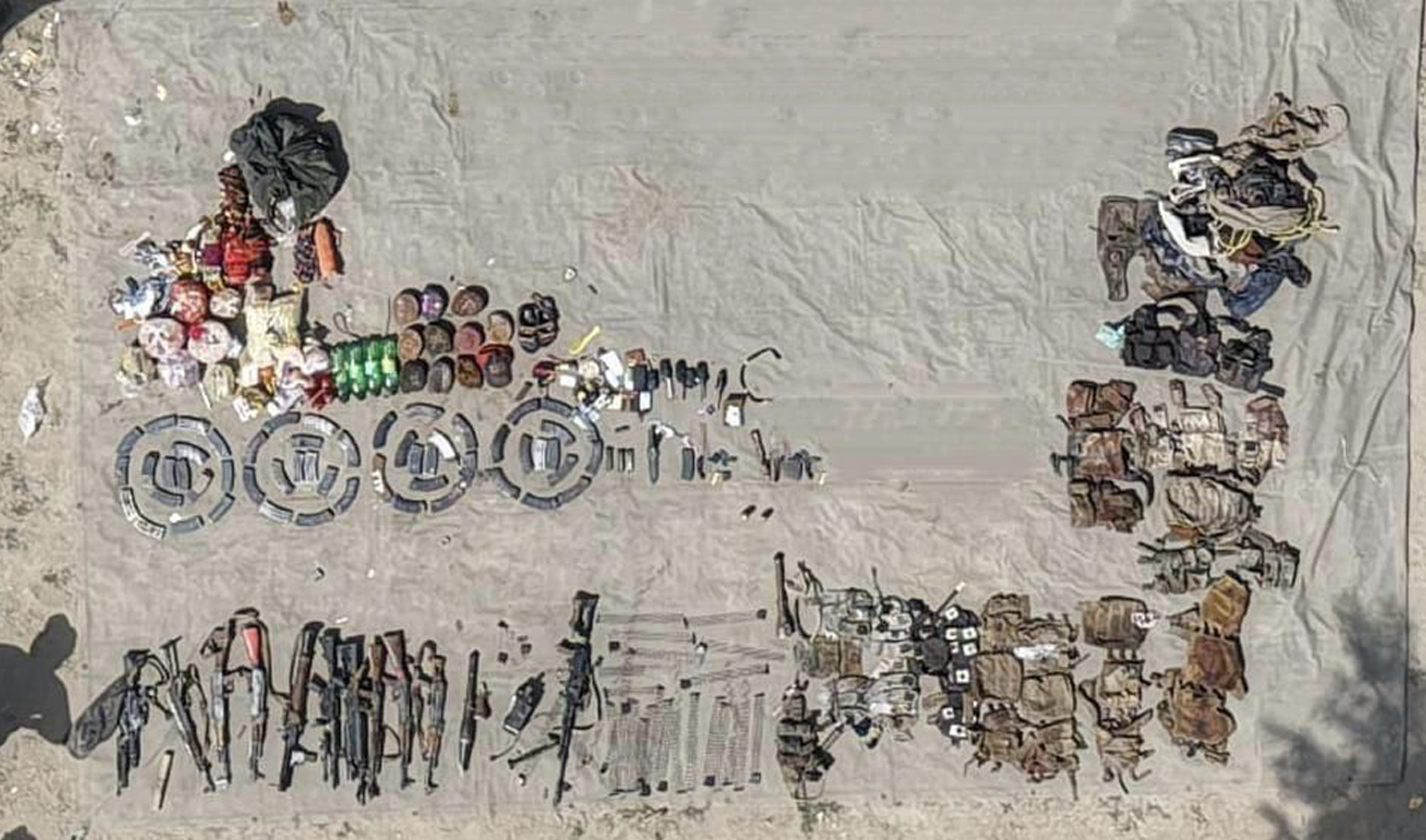 This handout photo, released by Pakistan’s Inter-Services Public Relations on September 27, 2025, shows weapons and ammunition recovered from militants following an intelligence based operation in Lakki Marwat district, Khyber Pakhtunkhwa. (Handout/ISPR)