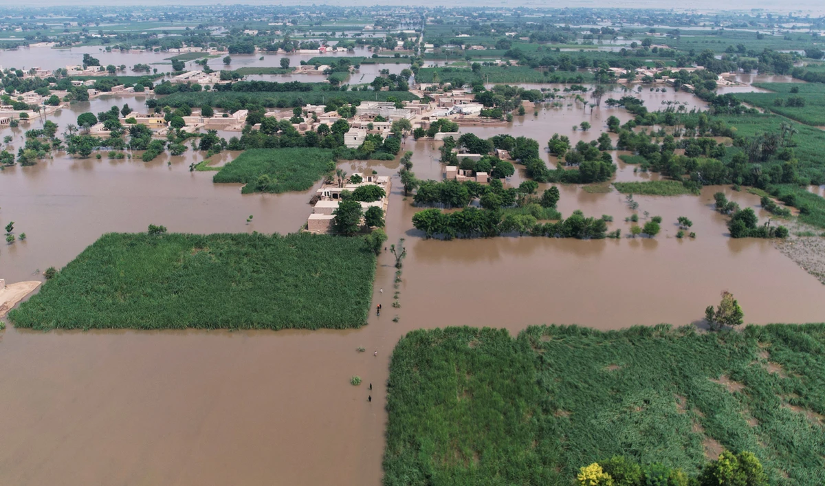 Rescue workers evacuate villagers from a flood hit area, in Tiba Gheal village, in Jhang district, Pakistan on September 2, 2025. (AP)
