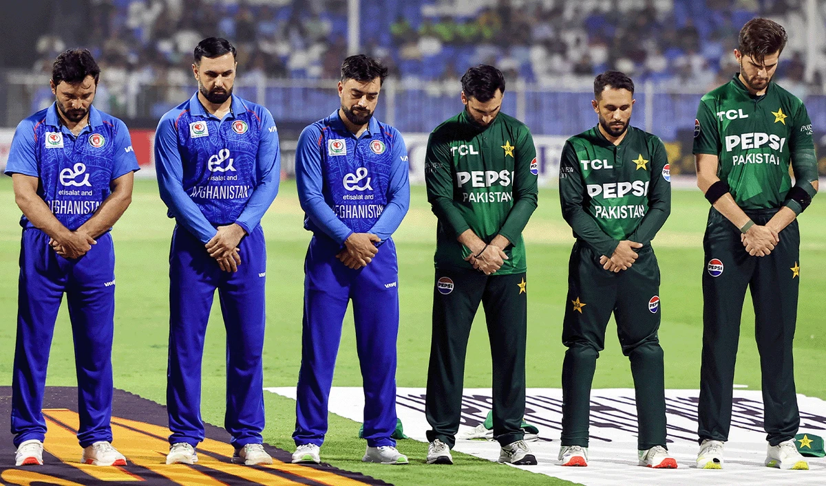 Players observe a minute of silence for the earthquake victims in Afghanistan and for the flooding victims in Pakistan before the T20 international cricket match between Afghanistan and Pakistan, in Sharjah, on September 2, 2025. (AFP/File)