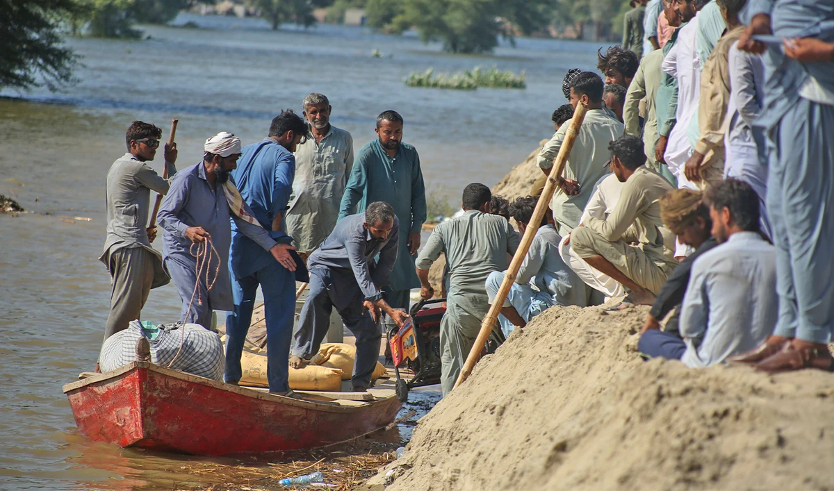 illagers get off from a boat after being evacuated by volunteers from a flooded area in Jalalpur Pirwala, in Multan district, Pakistan, on Sept. 10, 2025. (AP)