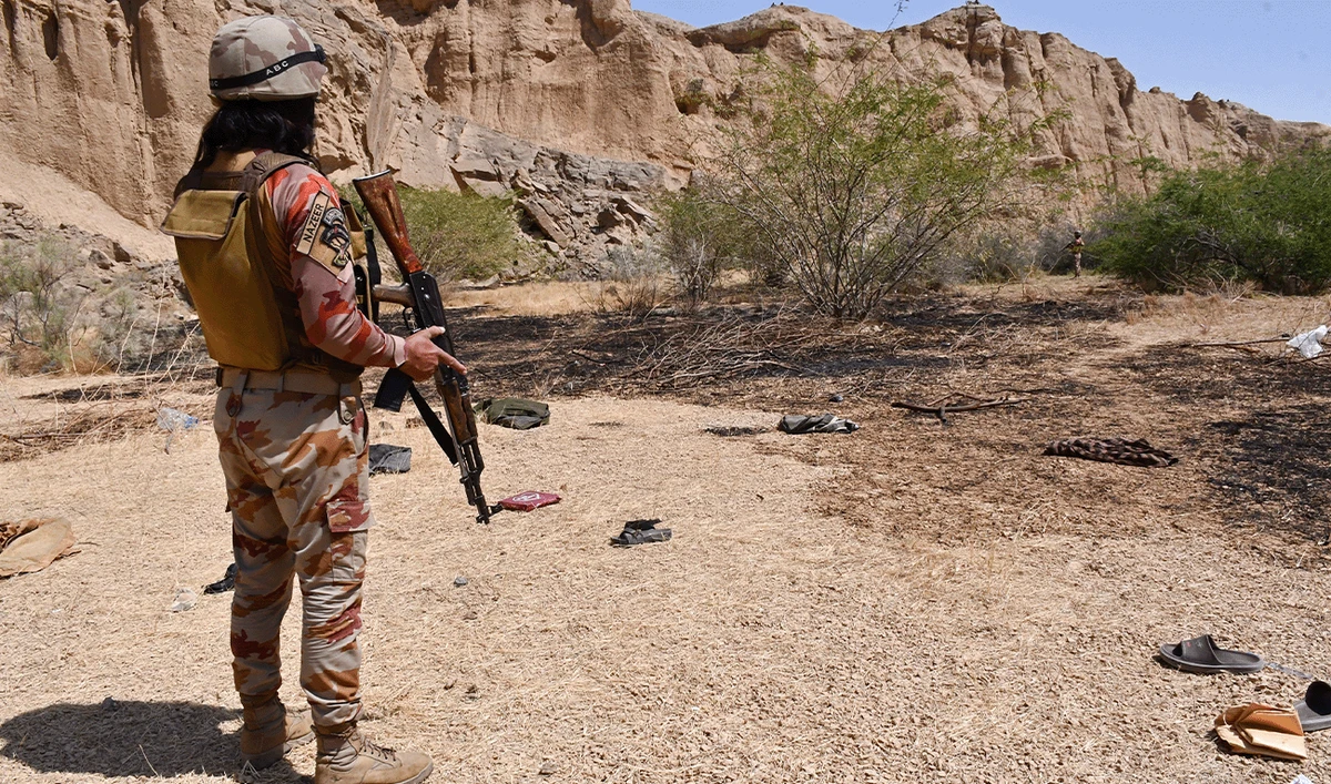Pakistan's Frontier Corps stands guard at the siege site after armed militants ambushed a train in the remote mountainous area, at Pehro Kunri in Balochistan province on March 15, 2025. (AFP/File)