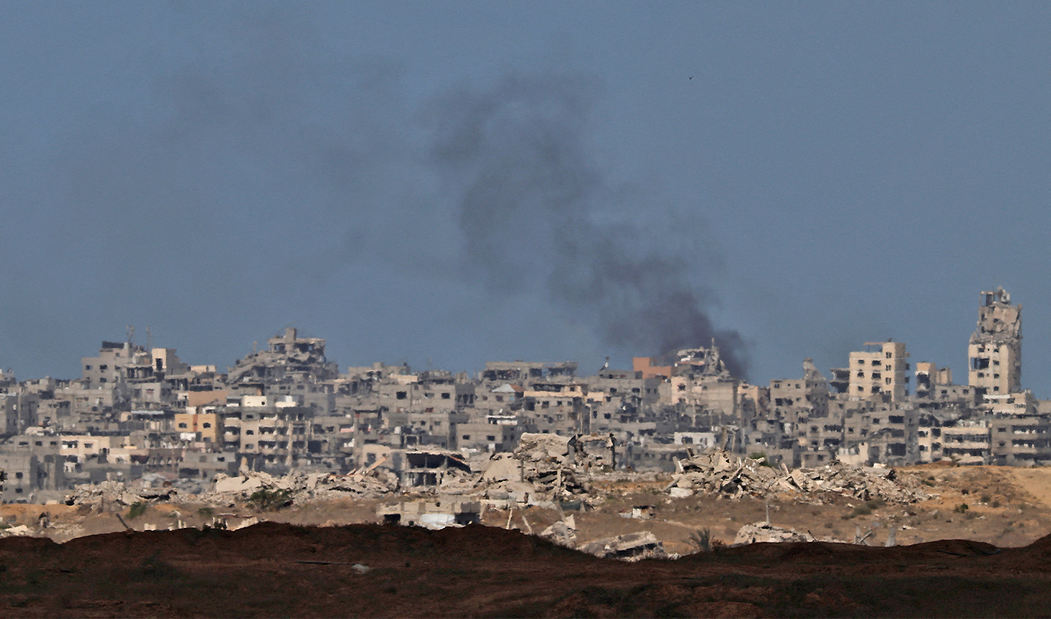 Smoke rises from Gaza after an explosion, as seen from the Israeli side of the border, on October 5, 2025. (REUTERS)