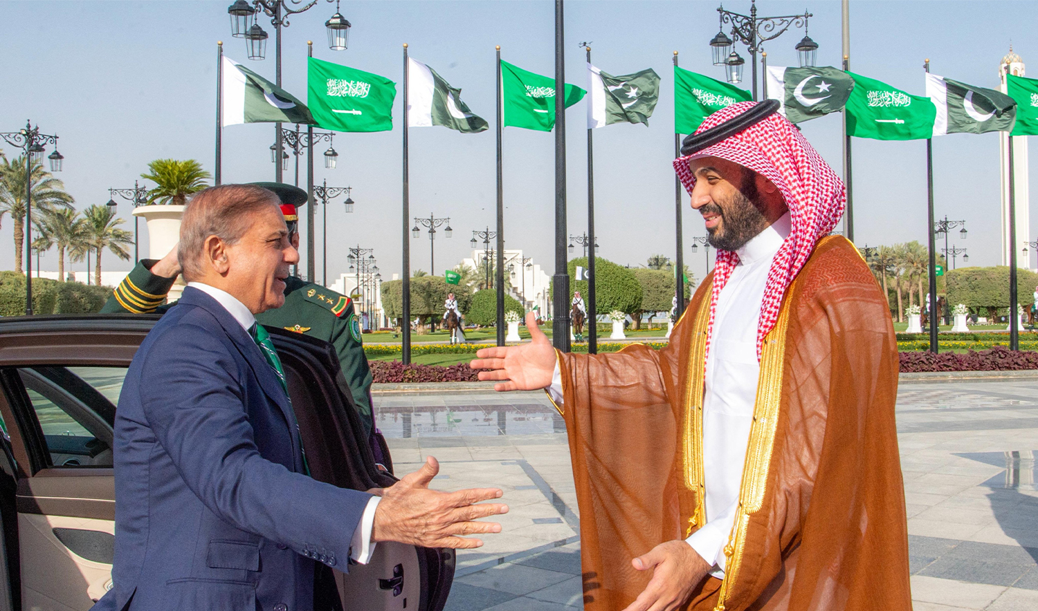 A handout picture provided by the Saudi Press Agency (SPA) on September 17, 2025, shows Saudi Arabia's Crown Prince Mohammed bin Salman (R) welcoming Pakistan's Prime Minister Shehbaz Sharif ahead of their meeting in Riyadh. (AFP/SPA/File)
