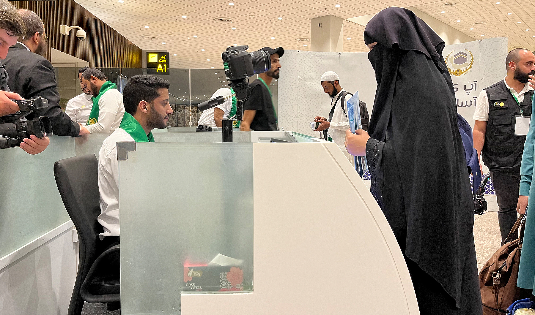 A Pakistani pilgrim goes through passport control under Route to Makkah initiative at Islamabad International Airport in Islamabad, Pakistan, on May 21, 2023, prior to the annual Hajj pilgrimage in the holy city of Makkah. (AN photo by Fatimah Amjad/File)