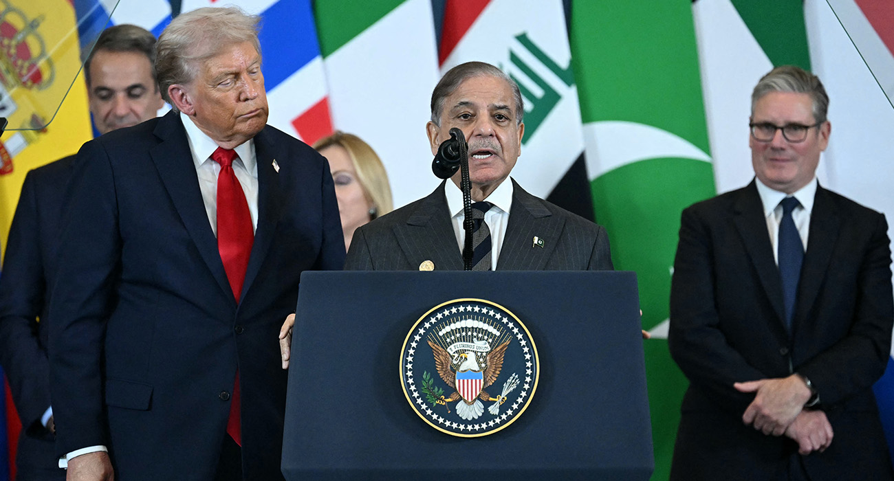 Pakistan's Prime Minister Shehbaz Sharif (C) speaks as US President Donald Trump (L) and Britain's Prime Minister Keir Starmer (R) watch during the Sharm El-Sheikh Peace Summit in the Egyptian Red Sea resort town of Sharm el-Sheikh on October 13, 2025. (AFP)