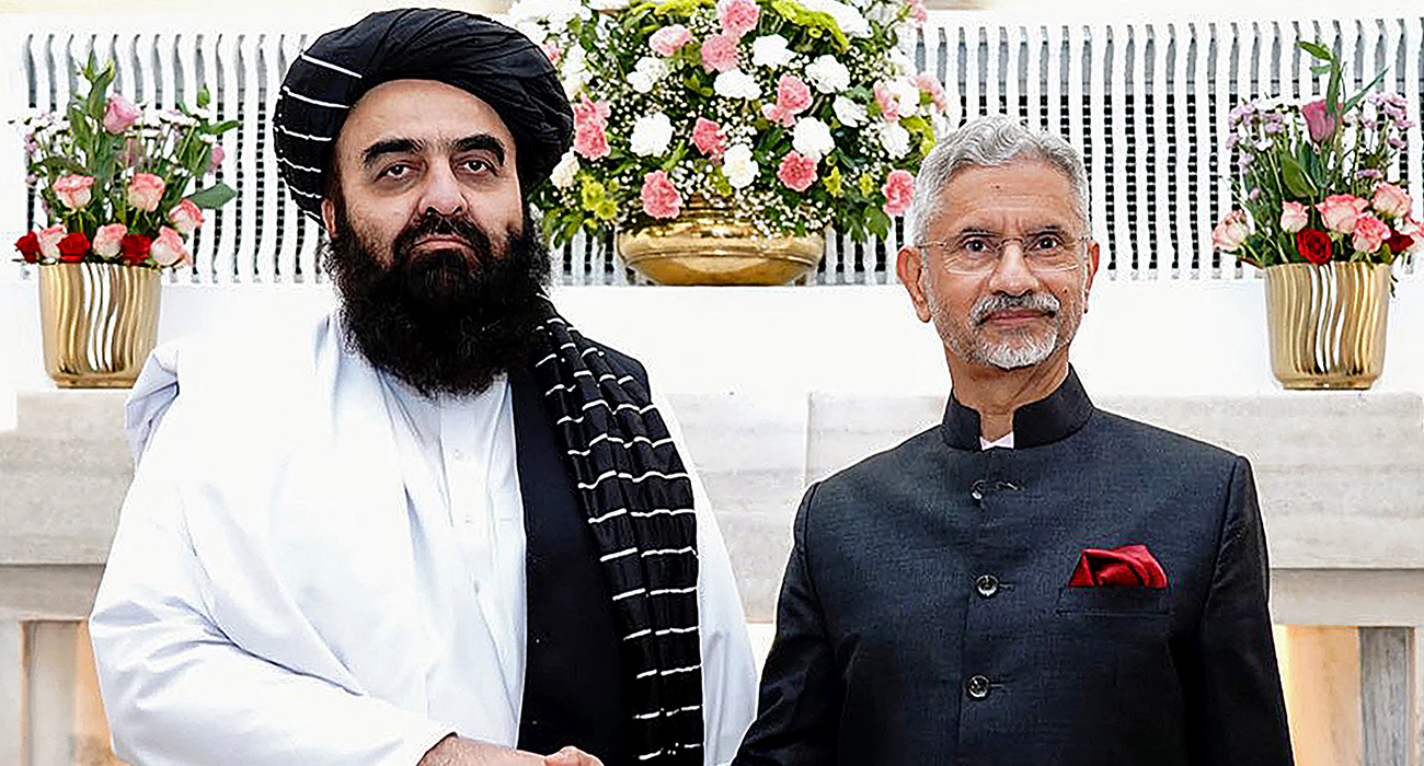 This handout photograph taken and released by India's Ministry of External Affairs on October 10, 2025 shows India's Foreign Minister Subrahmanyam Jaishankar (R) and his Afghan counterpart Amir Khan Muttaqi shaking hands during a bilateral meeting in New Delhi. (AFP)