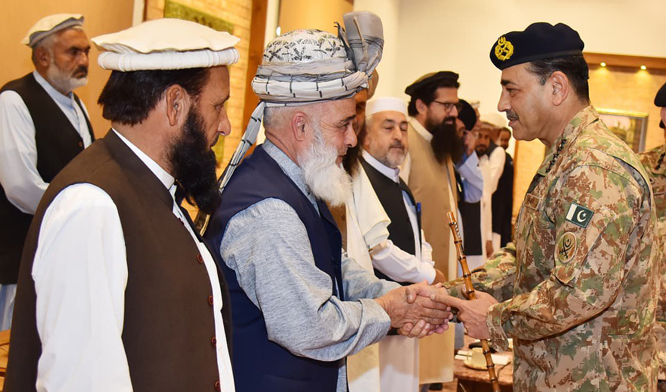 Pakistan’s army chief Field Marshal Asim Munir (right) meets tribal eleders in Peshawar on October 30, 2025. (Pakistan Army)