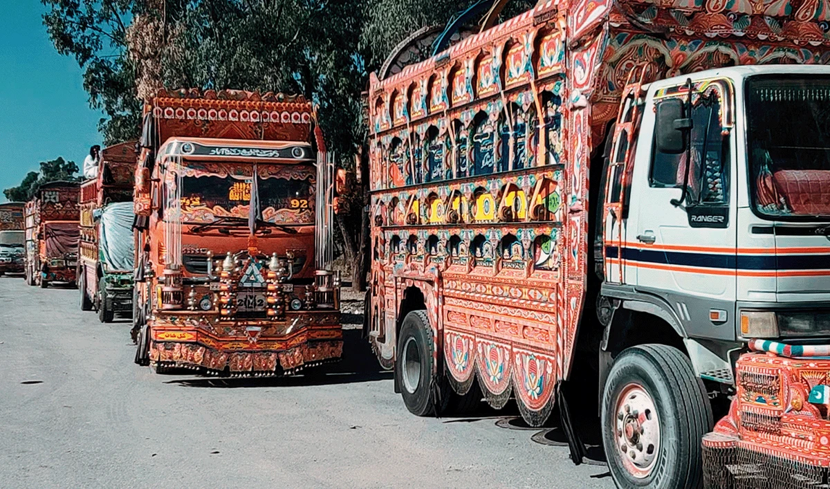 Trucks carrying goods stranded on a highway near Islamabad, Pakistan, on October 11, 2025, as police blocked major entry points to the capital with containers ahead of a protest called by religio-political party Tehreek-e-Labbaik Pakistan. (AN Photo)