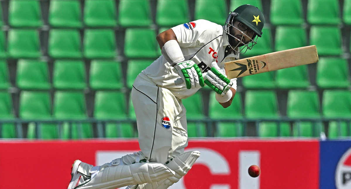 Pakistan's Imam-ul-Haq plays a shot during the first day of the first Test cricket match between Pakistan and South Africa at the Gaddafi Stadium in Lahore on October 12, 2025. (AFP)