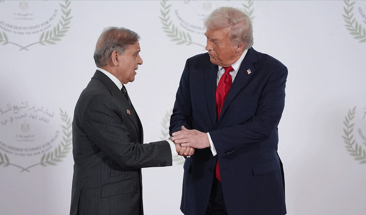 US President Donald Trump greets Pakistan's Prime Minister Shehbaz Sharif during a summit on Gaza in Sharm el-Sheikh on October 13, 2025. (AFP)