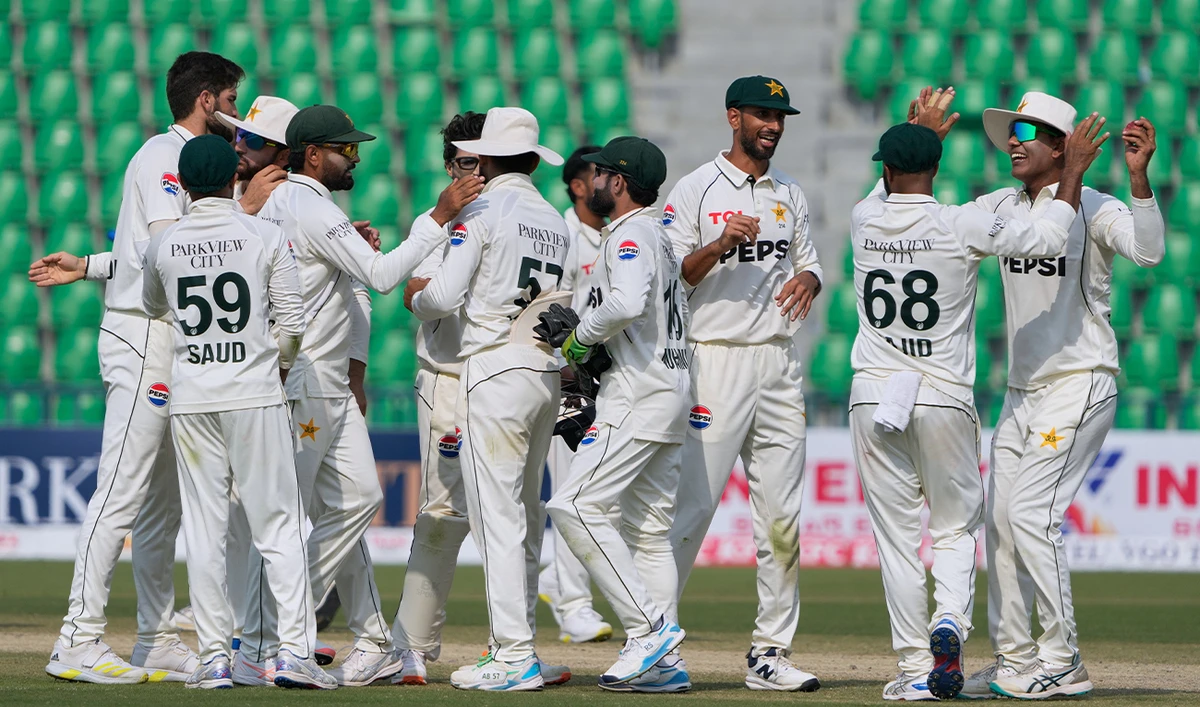 Pakistan team players celebrate after winning the first test cricket match against South Africa, in Lahore, Pakistan, on October 15, 2025. (AP)