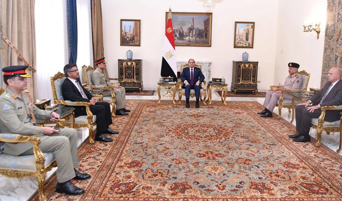 The handout photograph released on October 25, 2025, shows Egyptian President Abdel Fattah El-Sisi (center) meeting with Pakistan’s Army Chief Field Marshal Asim Munir (third left) in Cairo, Egypt. (ISPR)