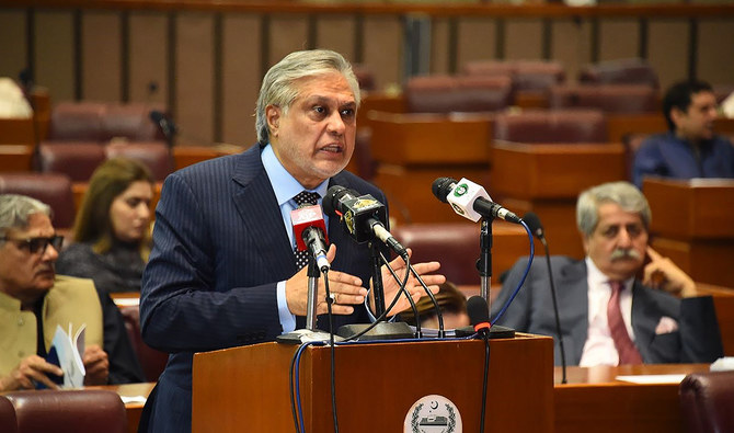 This handout photograph taken and released on June 9, 2023 by the Pakistan National Assembly, shows Pakistan's Finance minister Ishaq Dar presenting the budget 2023-2024 in the national assembly in Islamabad. (AFP/File)