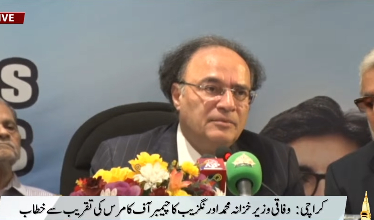A screengrab taken from Pakistan’s state television live telecast showing Finance Minister Muhammad Aurangzeb addressing a press conference in Karachi, Pakistan, on November 5, 2025. (PTV News/YouTube)